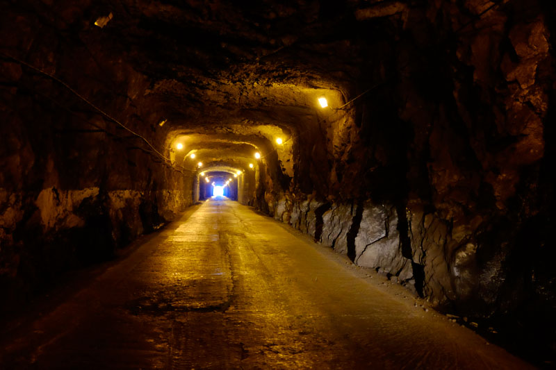 Tunnel entrance carved in volcanic rock on Madeira Island